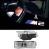 BMW dörrlampor M2 Logga