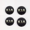 KIA Centrumkåpor svart 58mm 4-pack 