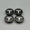 Tesla Centrumkåpor 57mm Svart / Vit